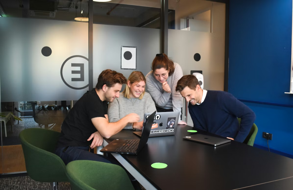 employees working on laptop